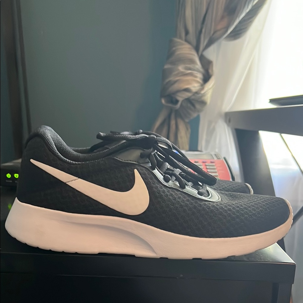 Nike Black Mesh Sneakers with White Swoosh